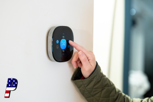 Woman adjusting temperature on digital thermostat